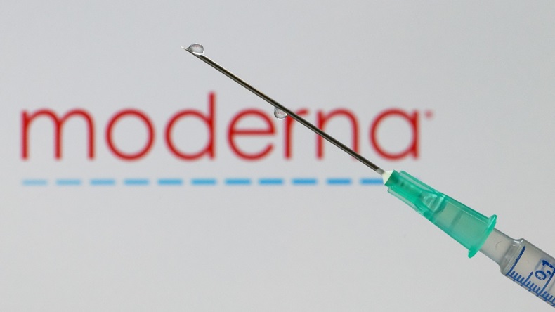 Moderna logo and syringe (Alex Gottschalk/DeFodi Images via Getty Images)