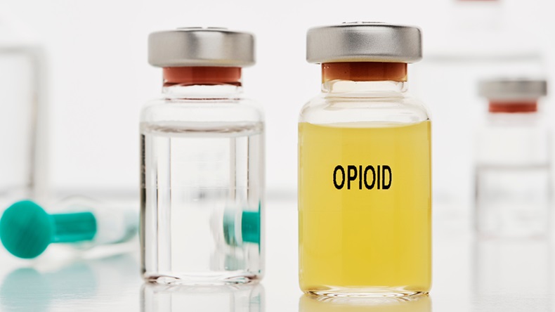 An ampoule with opioid. In the background there are still ampoules