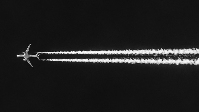 plane with contrails (source: shutterstock)
