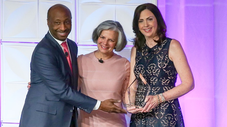 Julie Gerberding (center) with Kenneth C. Frazier, chairman and CEO of Merck, and Laurie Cooke, president and CEO of HBA, at 