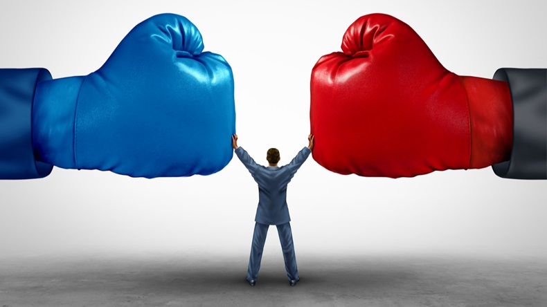 Mediate and legal mediation business concept as a businessman or lawyer separating two boxing glove opposing competitors as an arbitration success symbol for finding a solution to solve a conflict. - Illustration 