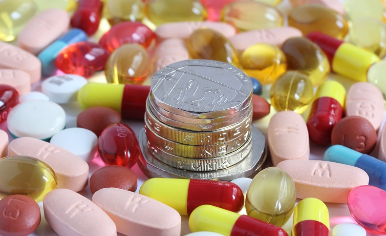money coins surrounded by pills tablets and capsules - Image 