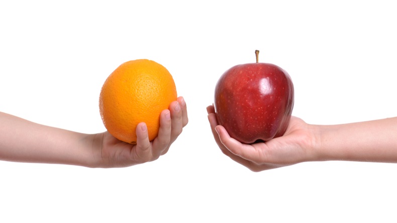 compare apple to orange white background - Image 