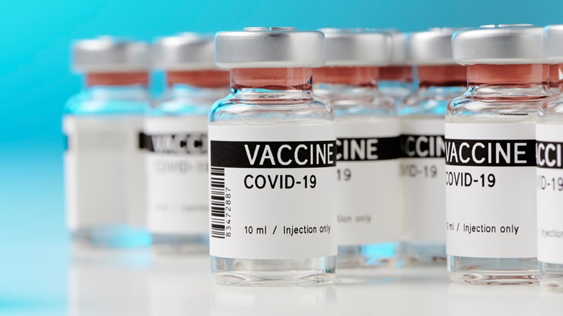 ampoules with Covid-19 vaccine on a laboratory bench. to fight the coronavirus / sars-cov-2 pandemic