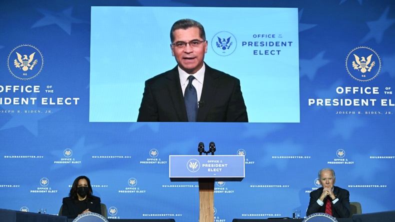 California Attorney General Xavier Becerra, who has been nominated by Biden to serve as secretary of Health and Human Services, speaks as President-elect Joe Biden (R) and Vice-President-elect Kamala Harris (L) look on as Biden announces his team tasked with dealing with the Covid-19 pandemic at The Queen in Wilmington, Delaware on December 8, 2020.  (Photo by JIM WATSON/AFP via Getty Images)