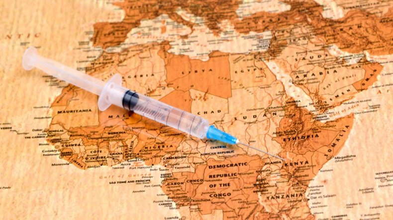 syringe on a map of africa