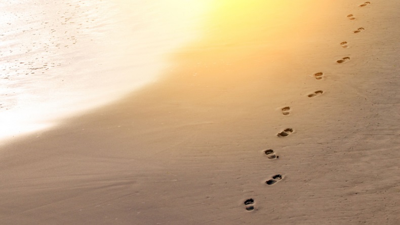 Footsteps on beach
