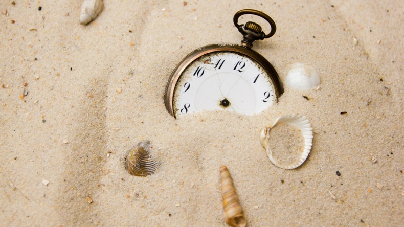 Clock in sand