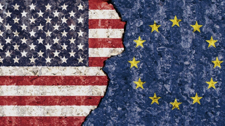 USA EU flag cracked wall background