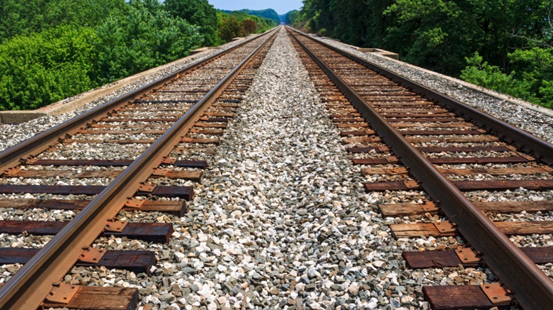 Two train tracks running parallel to each other 