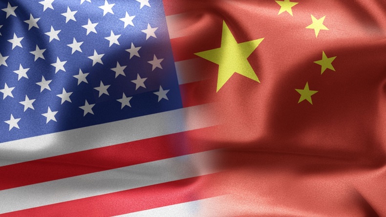 picture of American and Chinese flags slightly overlapping. 