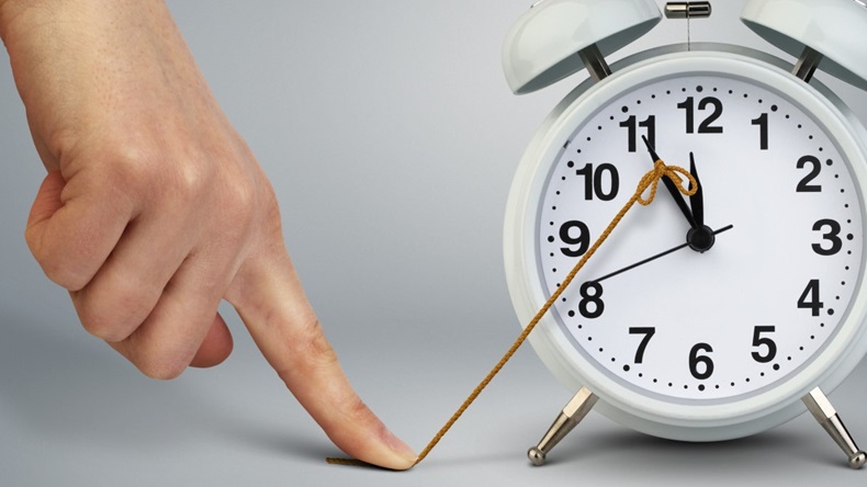 Hand stop time on clock, deadline concept