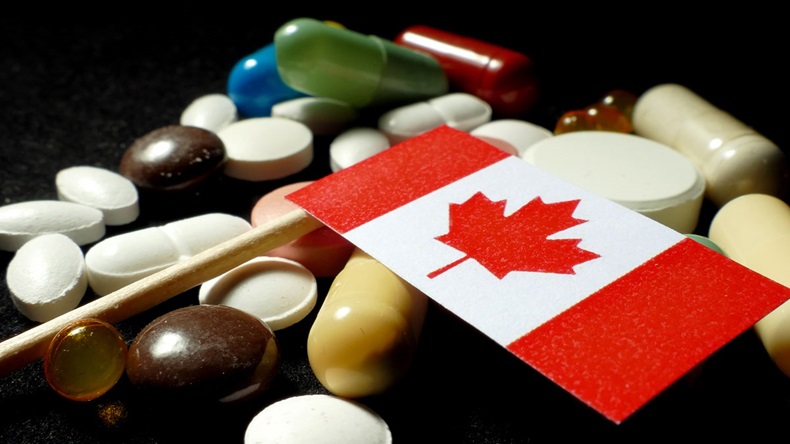 Canadian flag with lot of medical pills