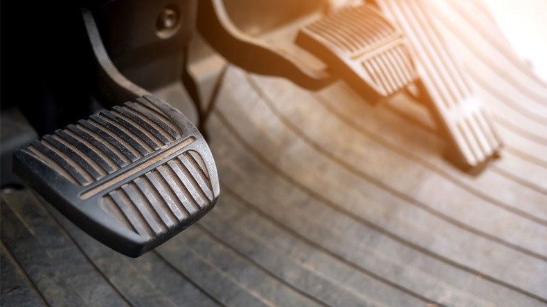 Foot pedals are levers of forklift car that are activated by the driver's feet to control certain aspects of the vehicle's operation brake pedal Car accelerator controls. - Image