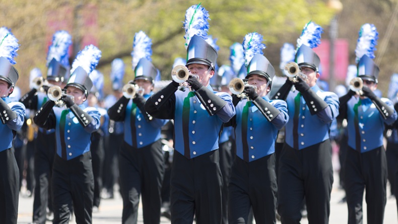 shutterstock-1070395178  Washington, D.C., USA - April 14, 2018 The Jaguar Pride Marching Band of Blue Springs South High School going down the road in the 2018 National Cherry Blossom Parade