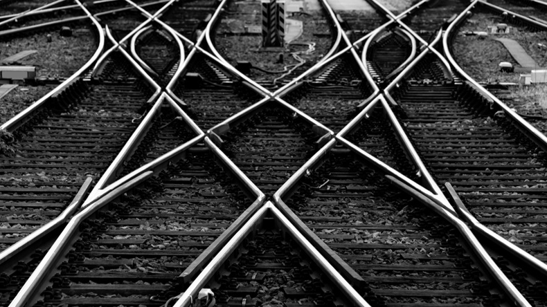 Railway tracks with switches and interchanges at a main line in Germany with geometrical structures black and white