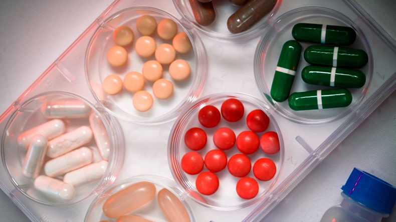 Samples of medicines, tablets, capsules, vitamins, and placebo