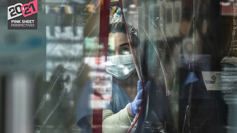 A pharmacist works while wearing personal protective equipment in the Elmhurst neighborhood on April 1, 2020 in New York City.
